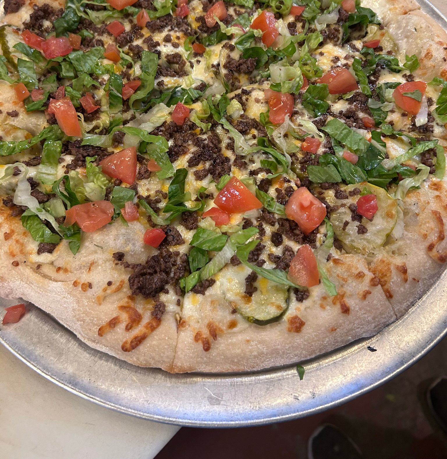 Semi-Famous Samburger Specialty Pizza.